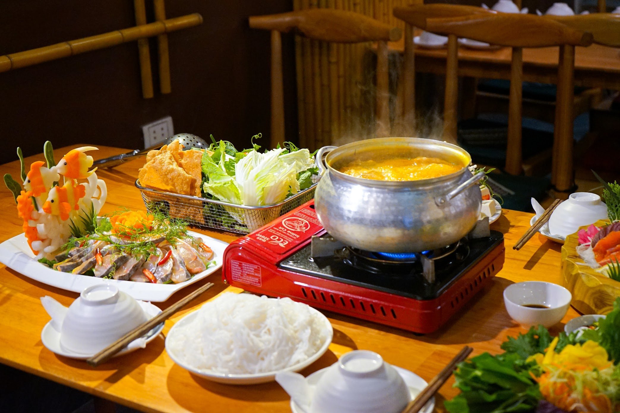 Salmon and Sturgeon Hotpot (Lau Ca Tam)