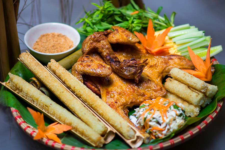 Sticky Rice Cooked in Bamboo Tube (Com Lam)